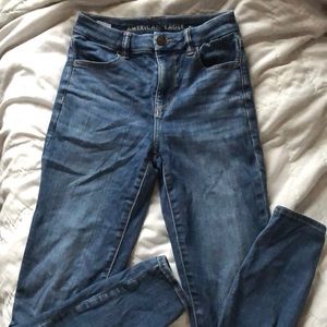 AMERICAN EAGLE NE(X)T LEVEL STRETCH JEANS SIZE 0/S